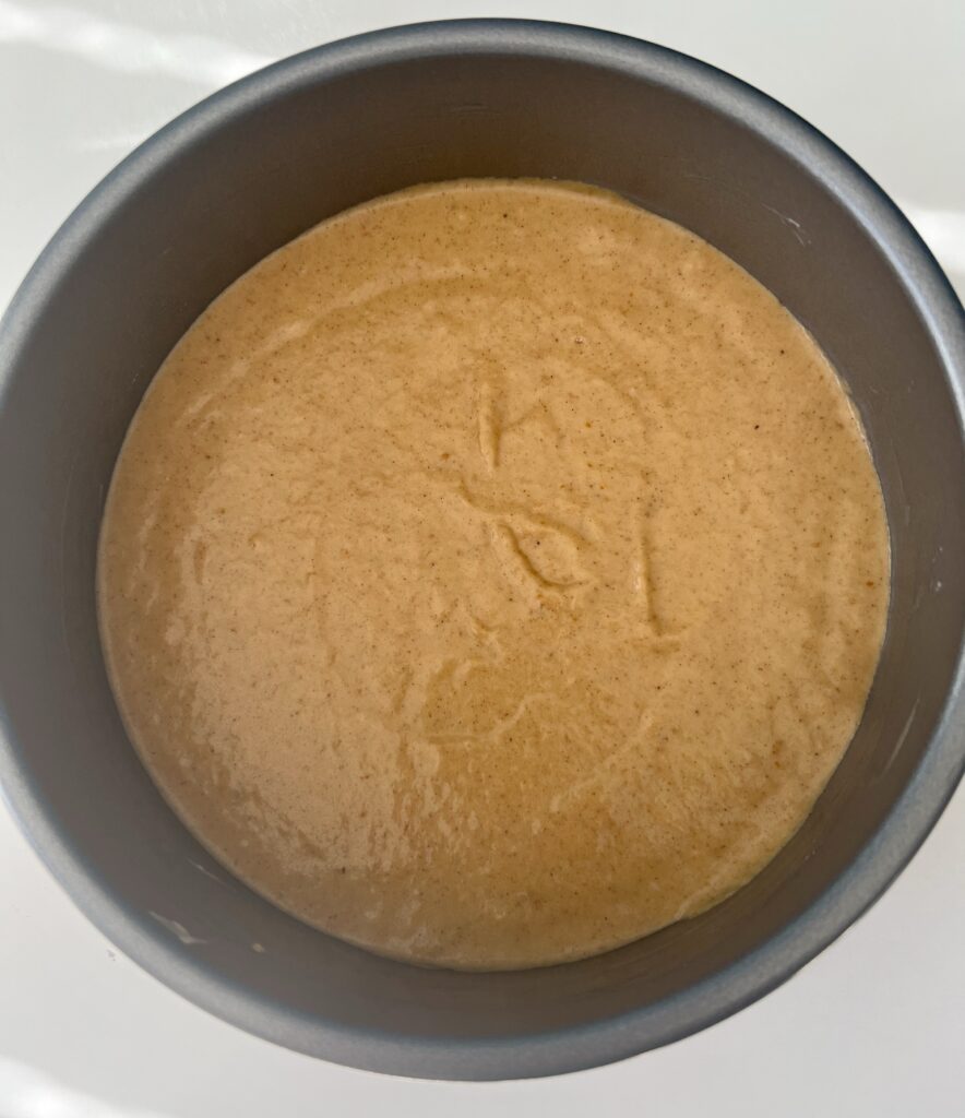 Pour cake mixture into pan