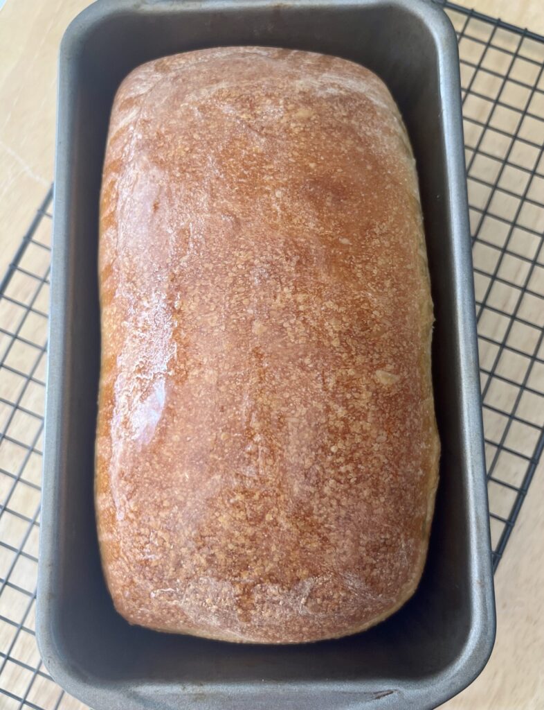 Easy Sourdough Sandwich Bread buttered loaf