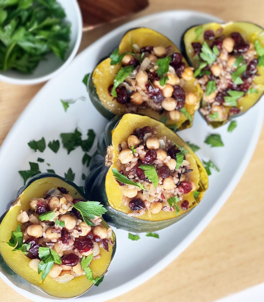 Instant Pot Acorn Squash - Stuff your squash, sprinkle cranberries & parsley on each one and enjoy!