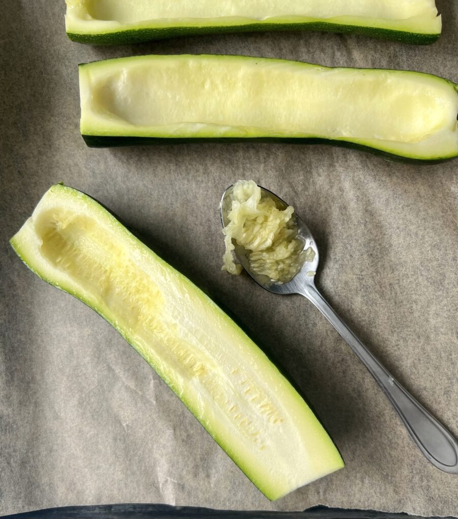 Scoop out the zucchini seeds and align your boats on the pan