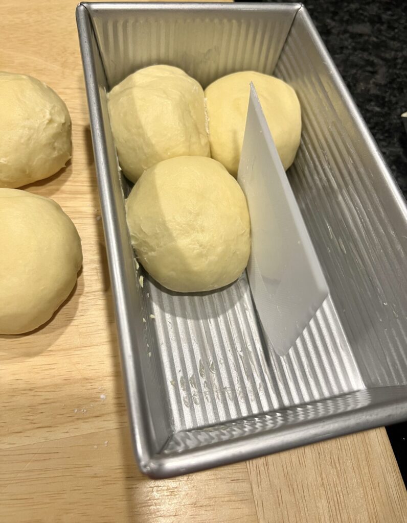 sourdough brioche dough - squeeze dough balls