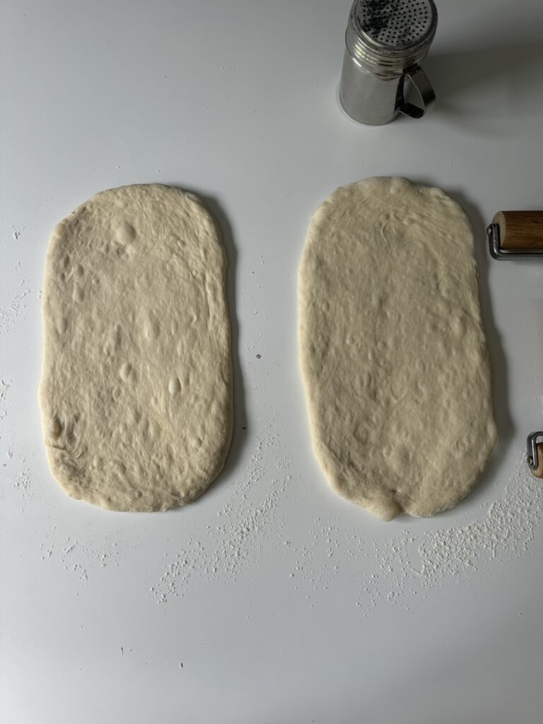 shaping sourdough french bread