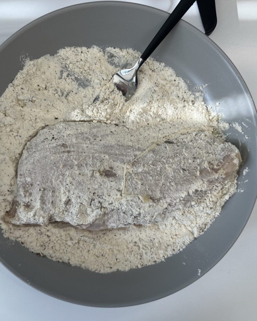 Dip each chicken breast in the egg mixture, then coat it in the flour mixture. 