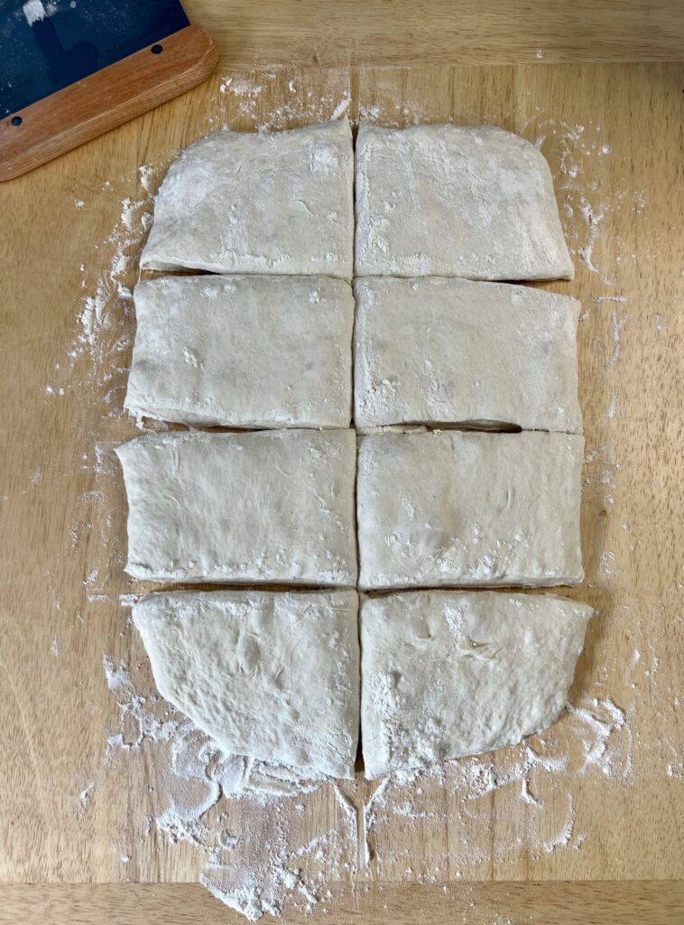 Pat the dough into a 9x14 rectangle and cut into 8 pieces