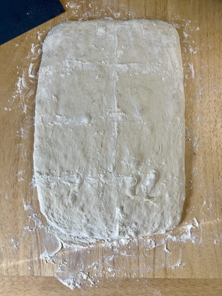 Pat the dough into a 9x14 rectangle and cut into 8 pieces