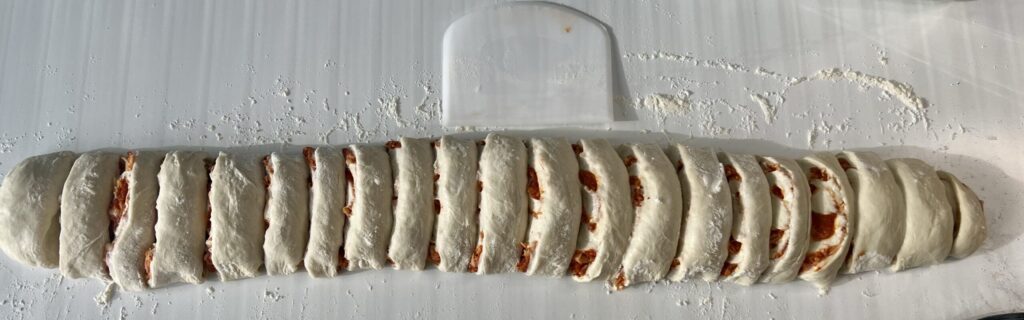 cutting sourdough pizza rolls