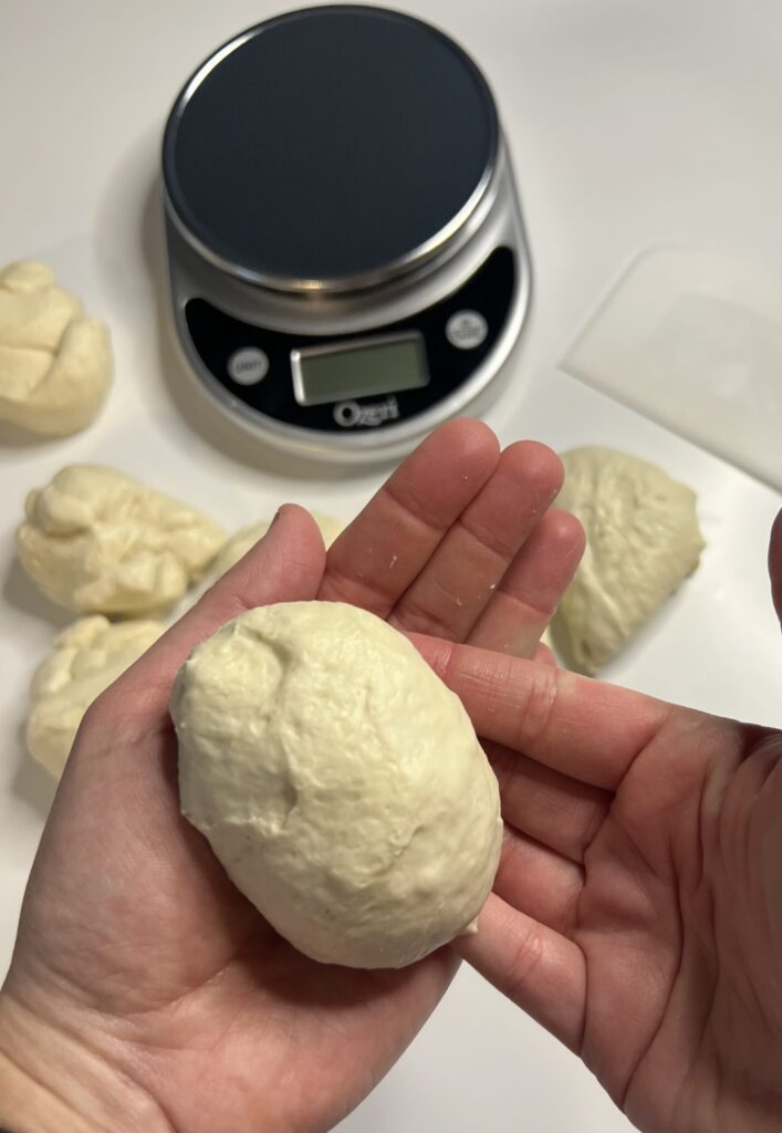 Scoop the dough under using your hands