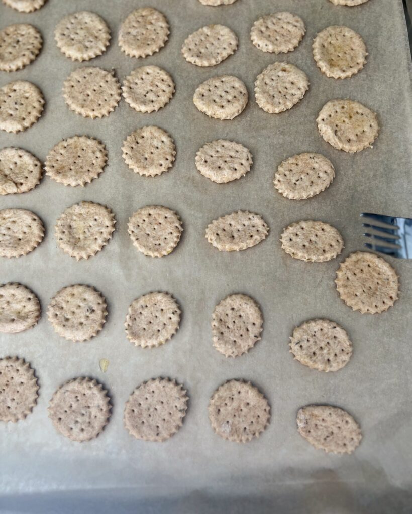 cutting sourdough discard crackers - poke holes in crackers