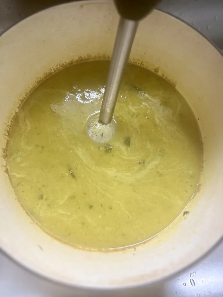 Once the zucchini is tender enough, use an immersion blender to puree the soup until smooth and creamy. Alternatively, you can use a stand-up