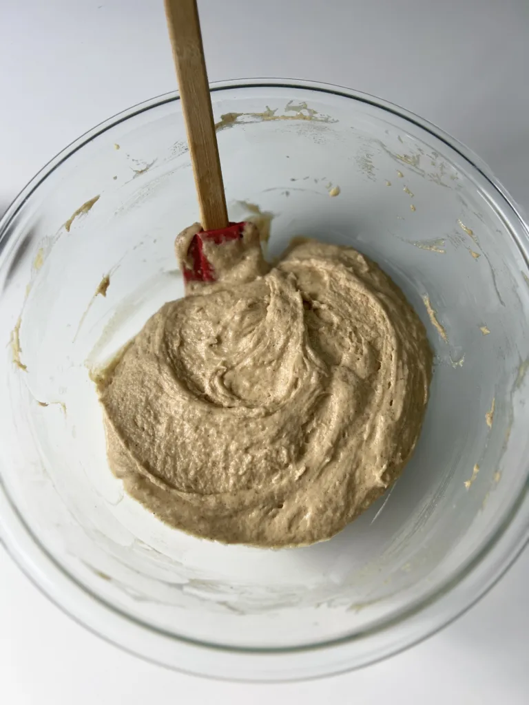 Gradually add the dry mixture to the wet mixture until everything is combined. No need to overmix here, it's okay if there are a few clumps. (I use a little of the electric mixer and then fold in the remainder with a silicone spatula)