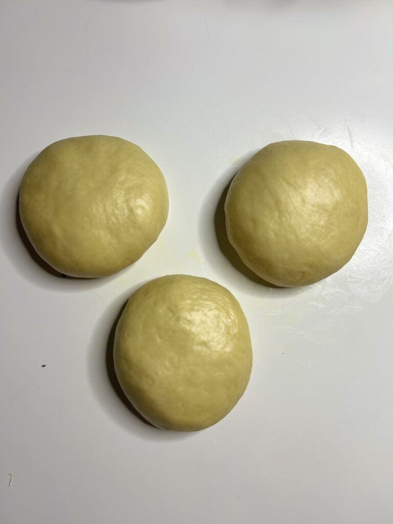 When the dough is ready to be shaped, divide it into 3 equal balls. This is best achieved by weighing your dough. My dough was around 820 grams. Therefore, each dough ball was roughly 273 grams each. 