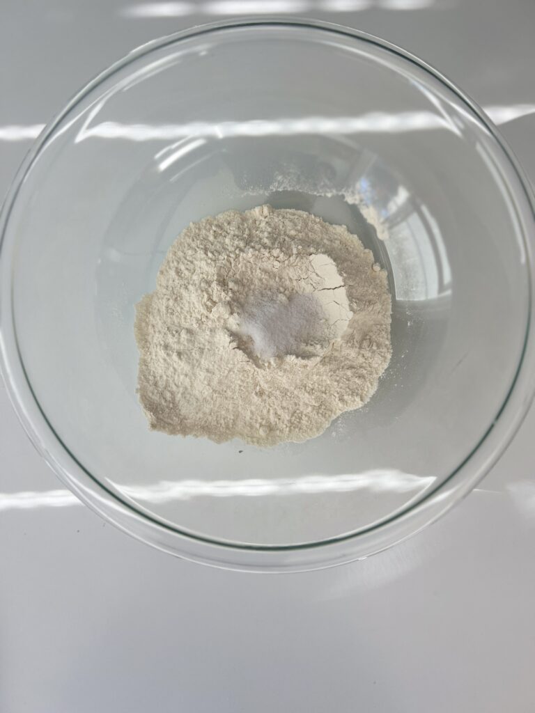 In a mixing bowl combine the flour, sugar, and salt. 
