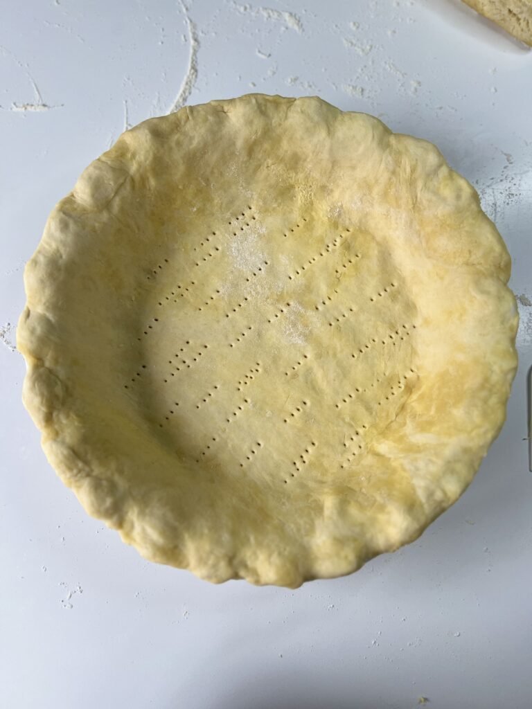 sourdough pie crust - You may need to cut off any extra crust. Then crimp the edges of the two pie crusts together using your fingers or a fork until they are sealed together all the way around.