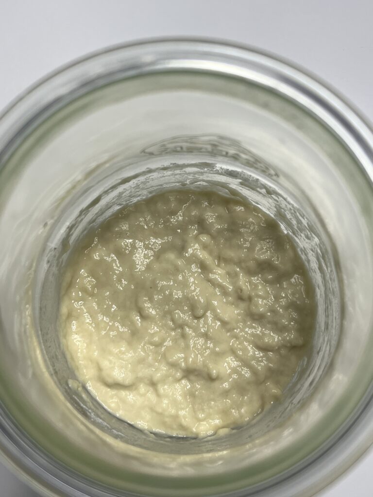 sweet stiff sourdough starter - add the flour and mix until no traces of flour are left.