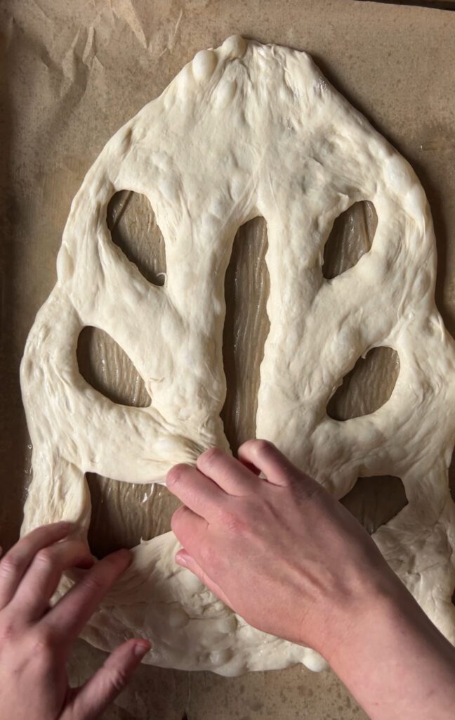 pulling apart the fougasse dough