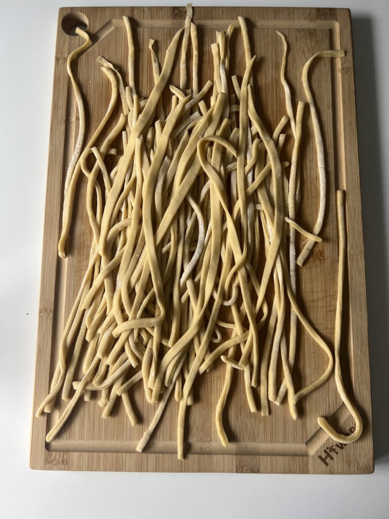 sourdough pasta on cutting board