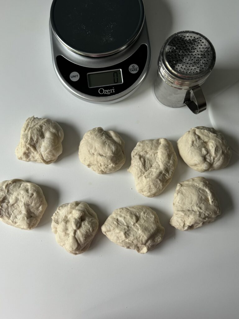 shaping sourdough crusty rolls