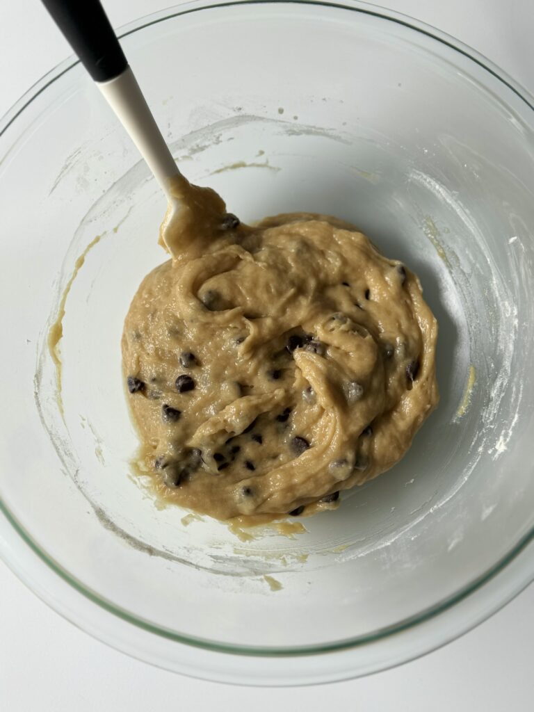 mixing in chocolate chips to the blondies