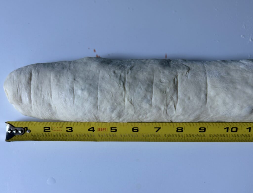 measuring and cutting pizza scrolls