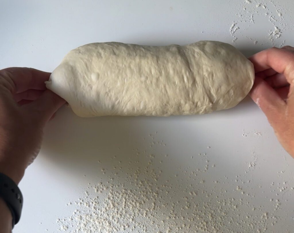 shaping sourdough French bread