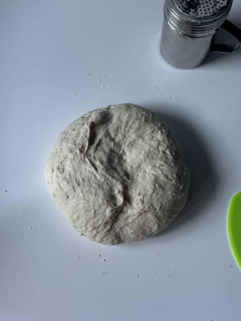 kneading sourdough french bread dough