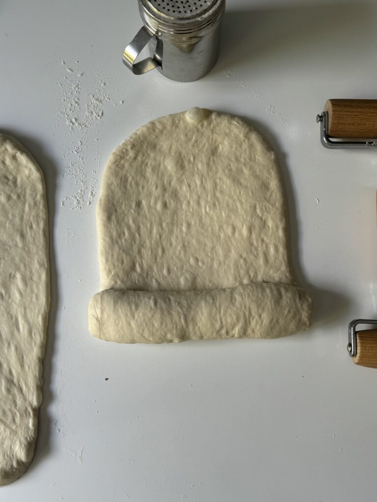 shaping sourdough french bread