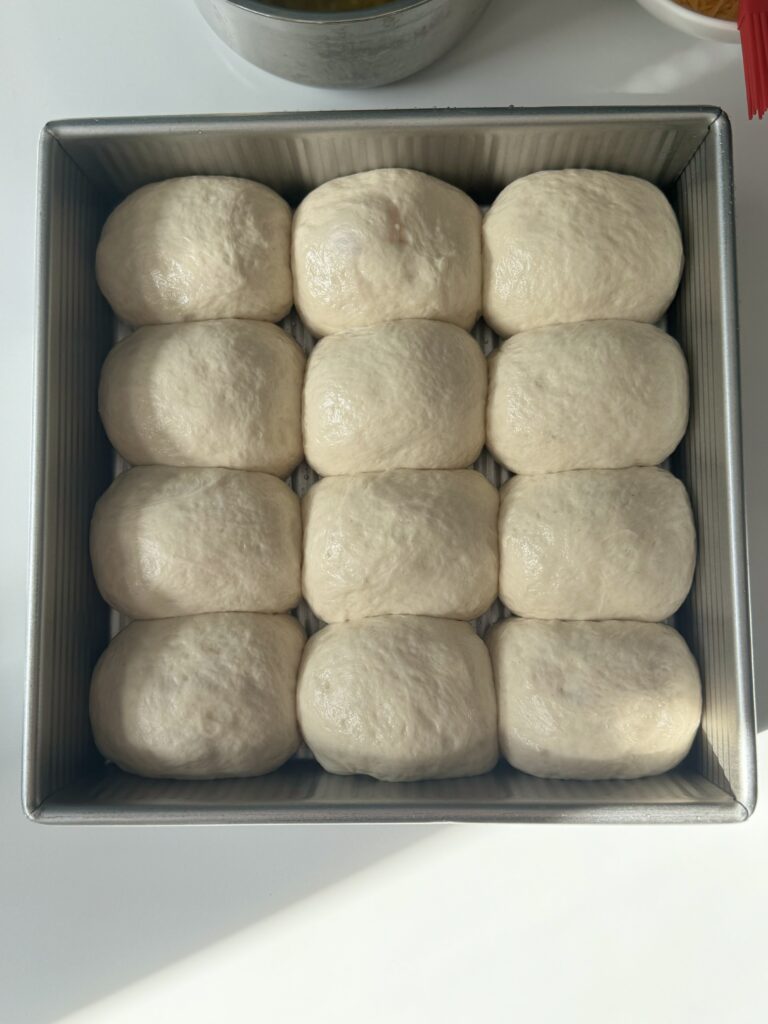 proofed stuffed sourdough cheese buns