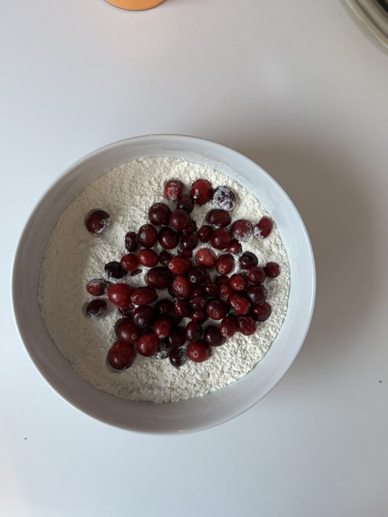 mixing sourdough cranberry bread