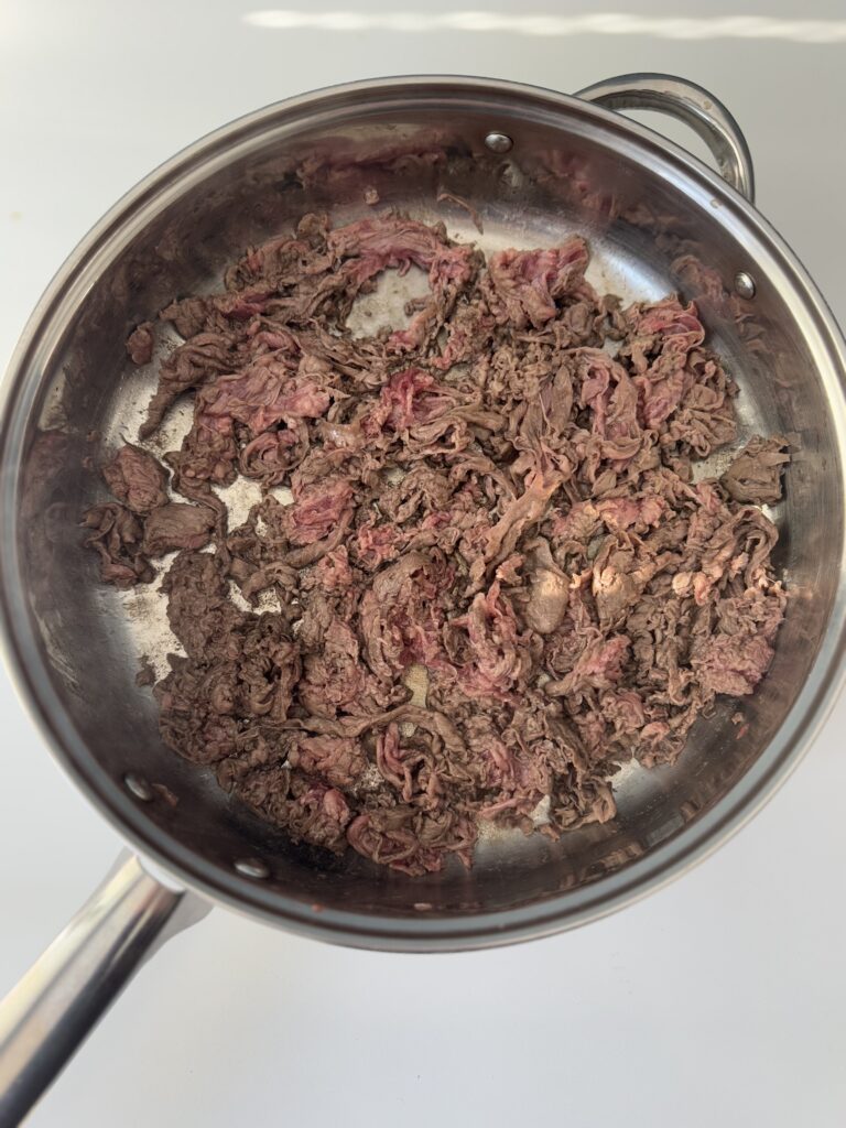 searing philly cheesesteak meal