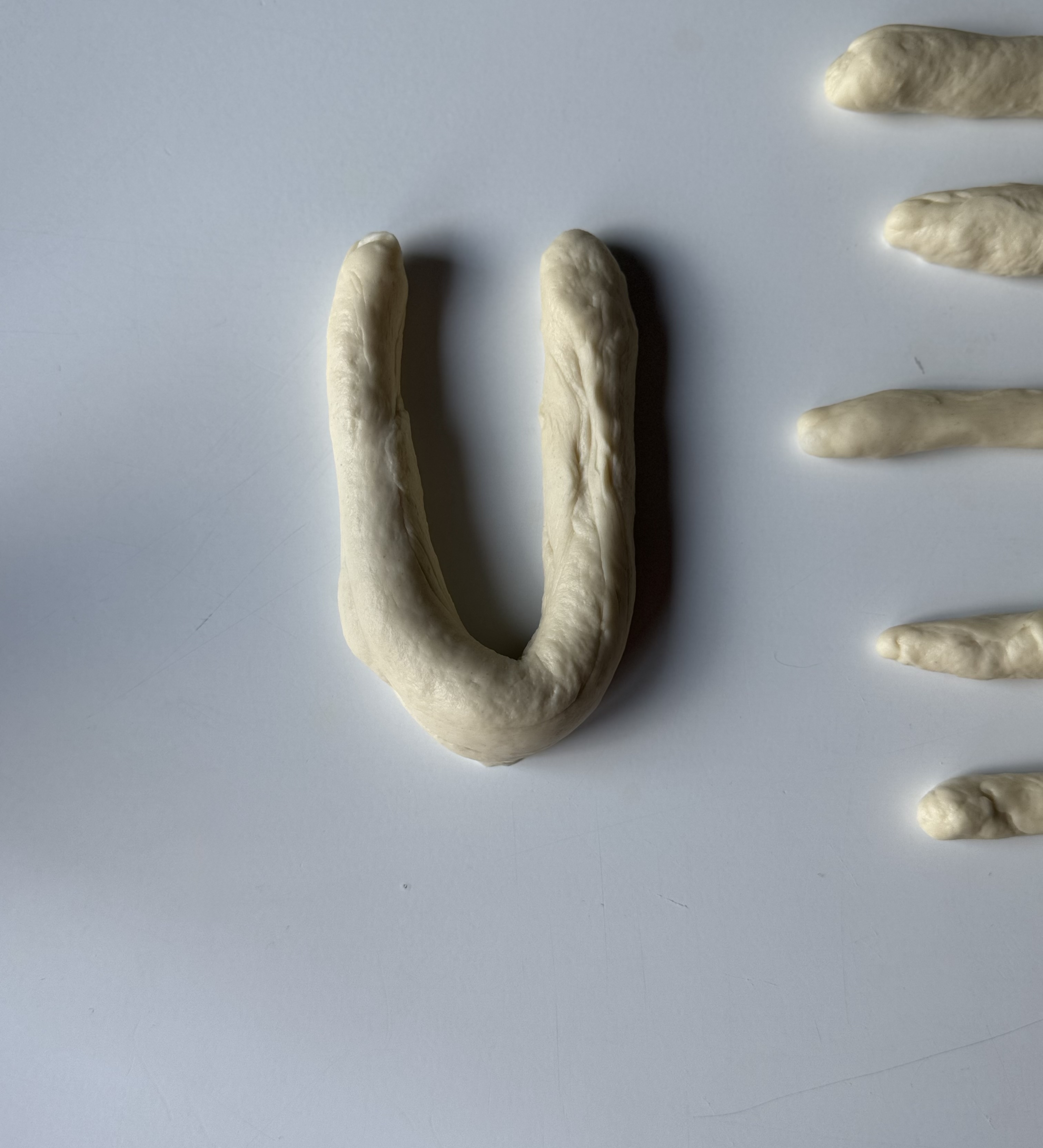 shaping sourdough garlic knots