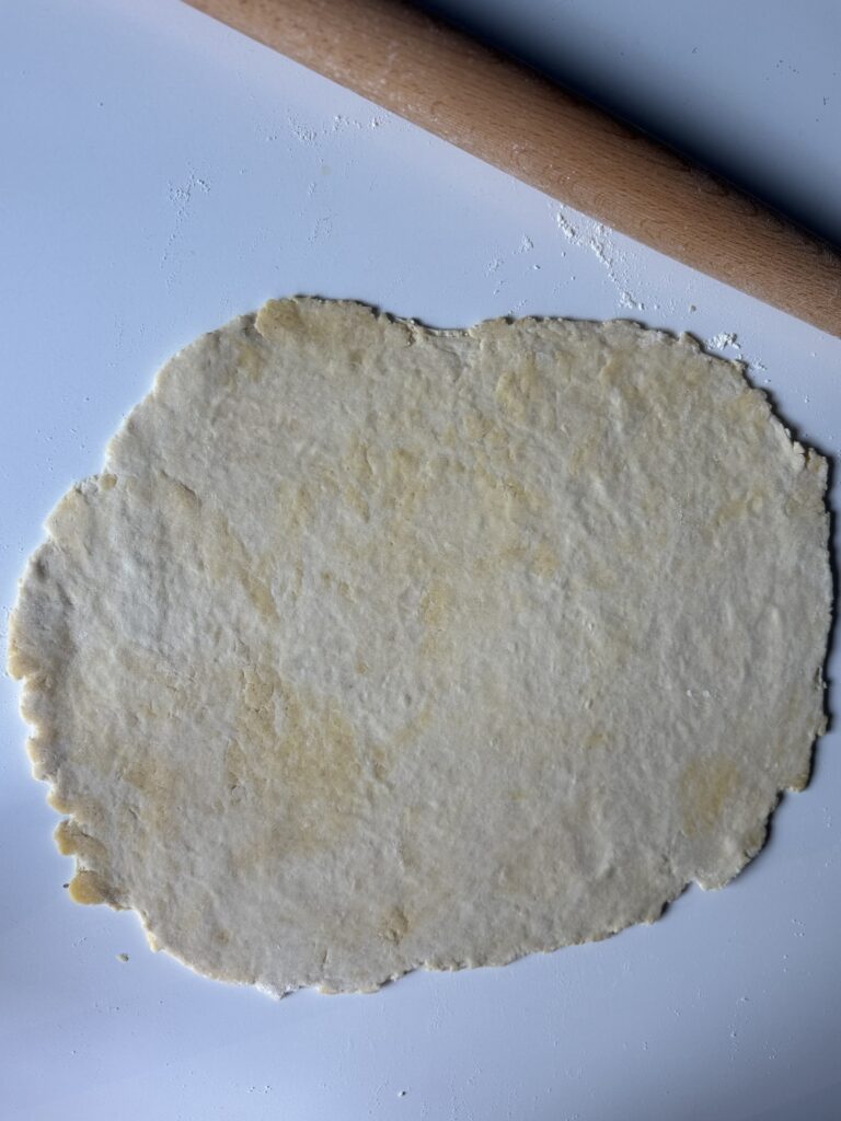 rolling out the pie crust