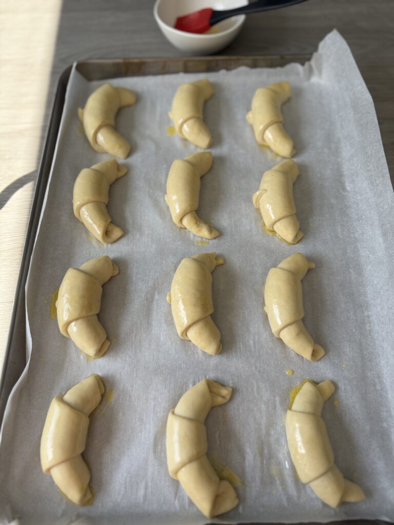 brushing crescent rolls