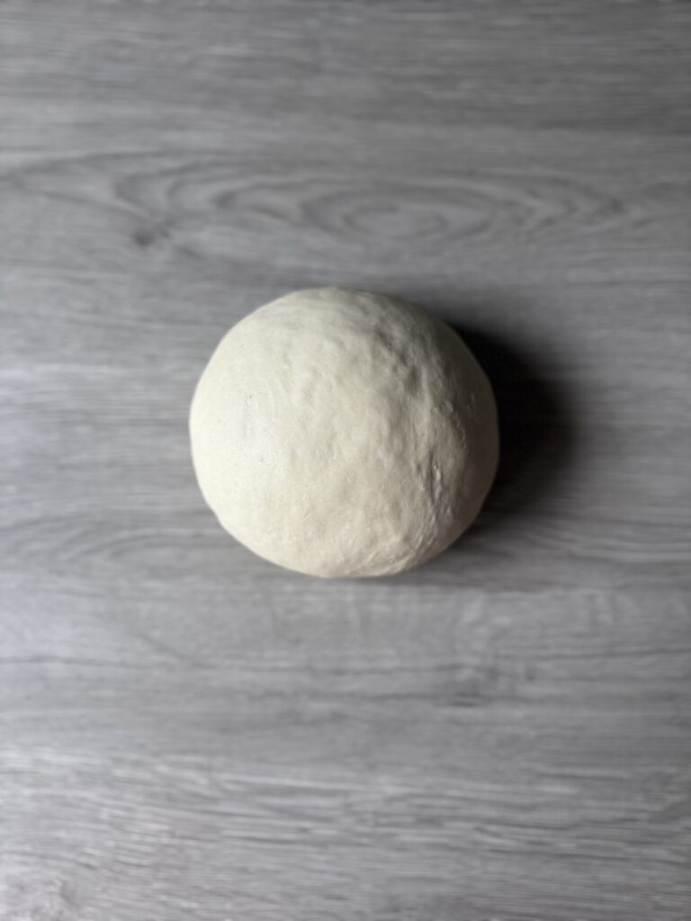 kneading sourdough pita dough