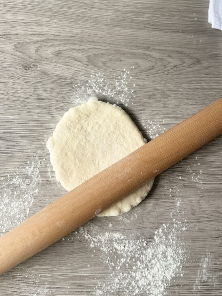 rolling the pita round