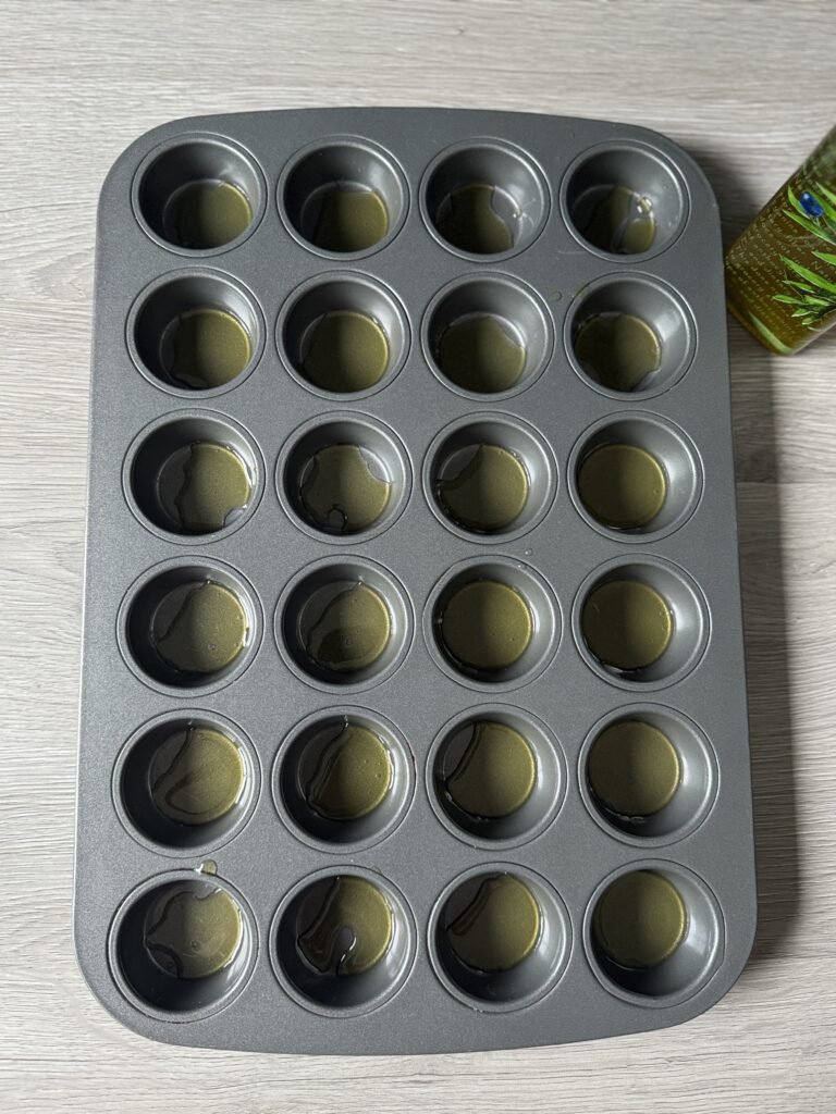 greased muffin pan
