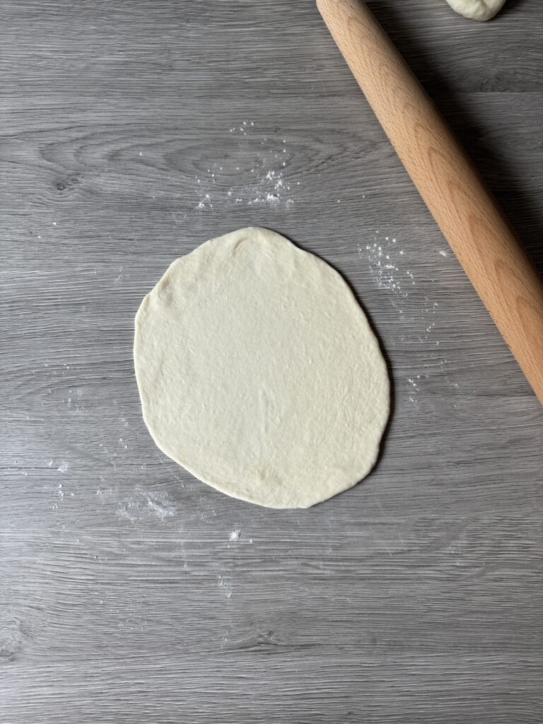 rolling out flatbread
