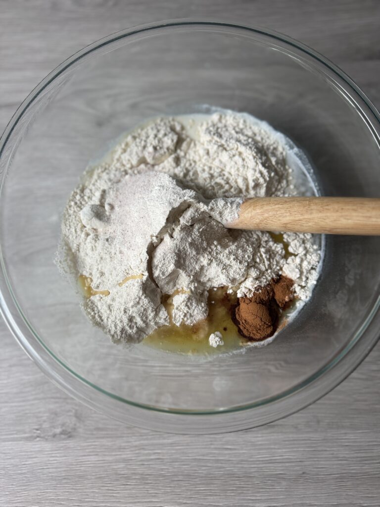 mixing cinnamon raising sourdough english muffins