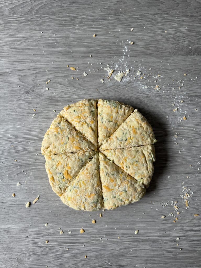 cutting zucchini scones