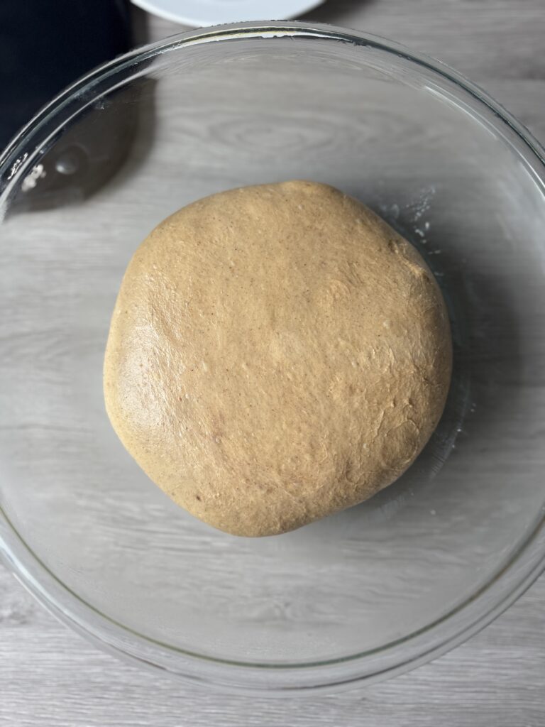 proofed pumpkin spice sourdough English muffins