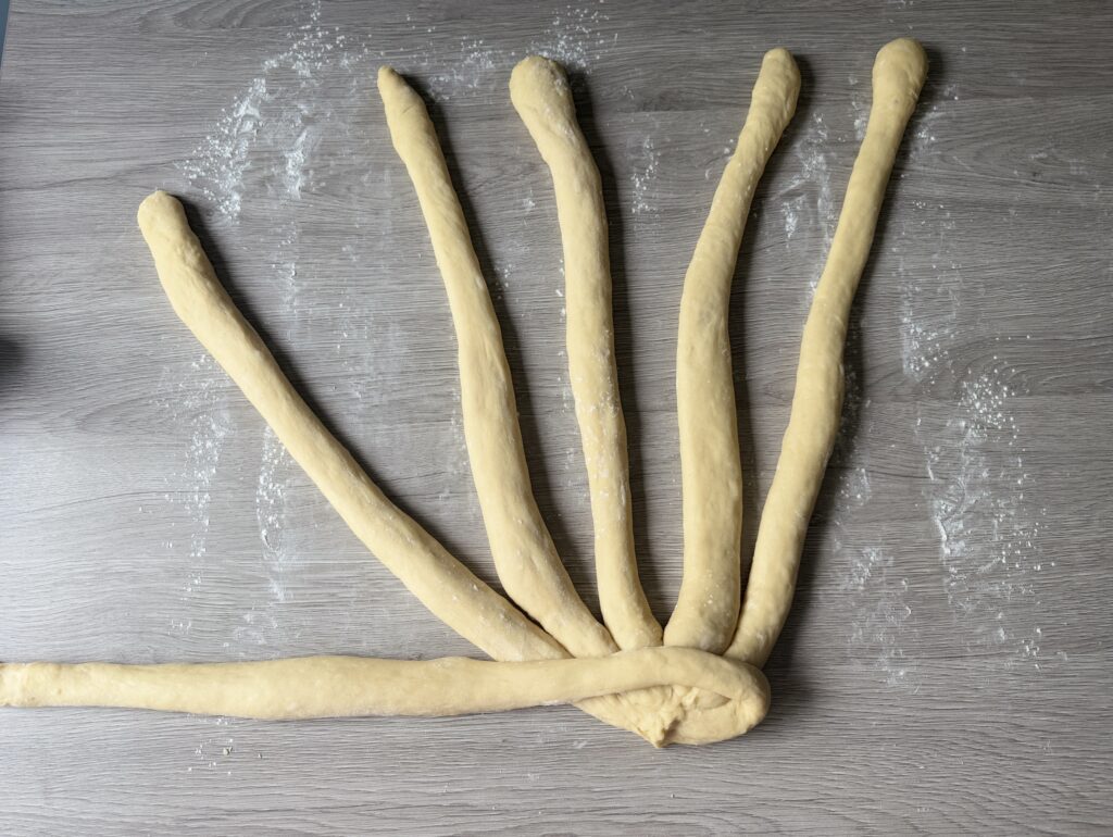braiding challah dough