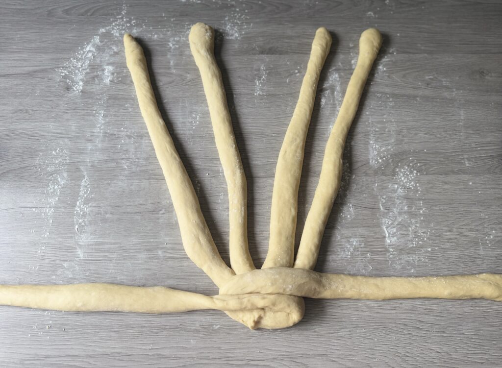 braiding challah dough