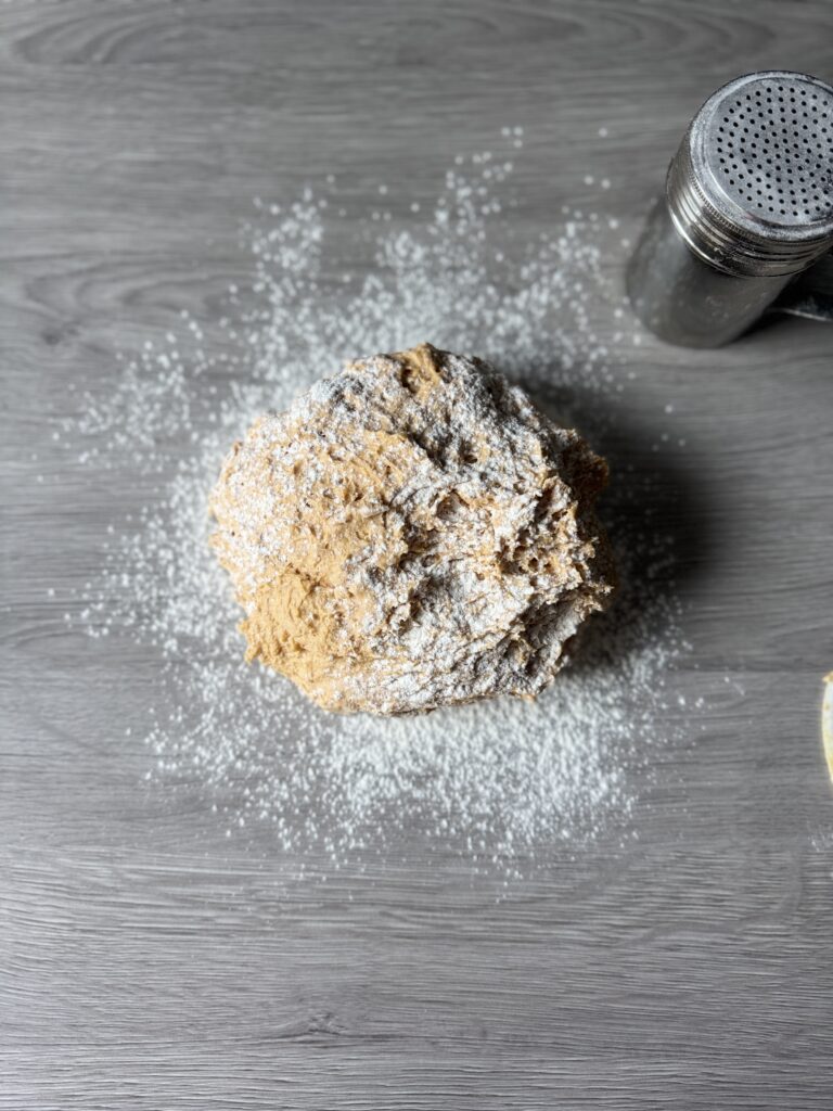 kneading sourdough discard pumpkin sticks dough