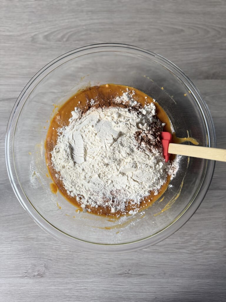 mixing sourdough pumpkin cake