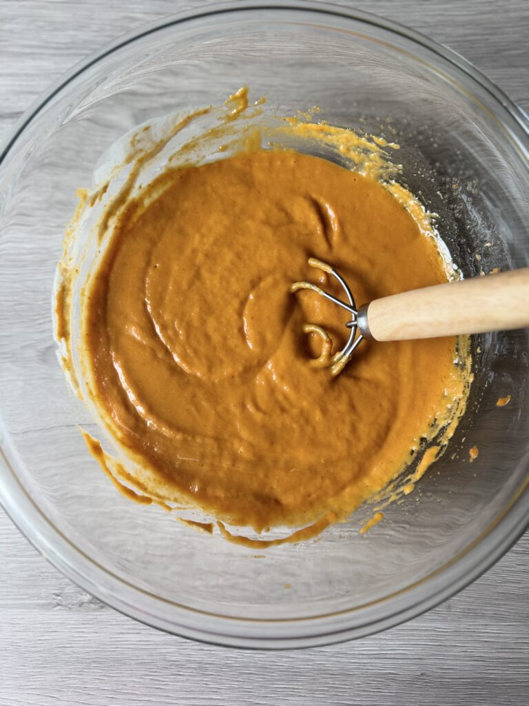 mixing sourdough pumpkin quick bread