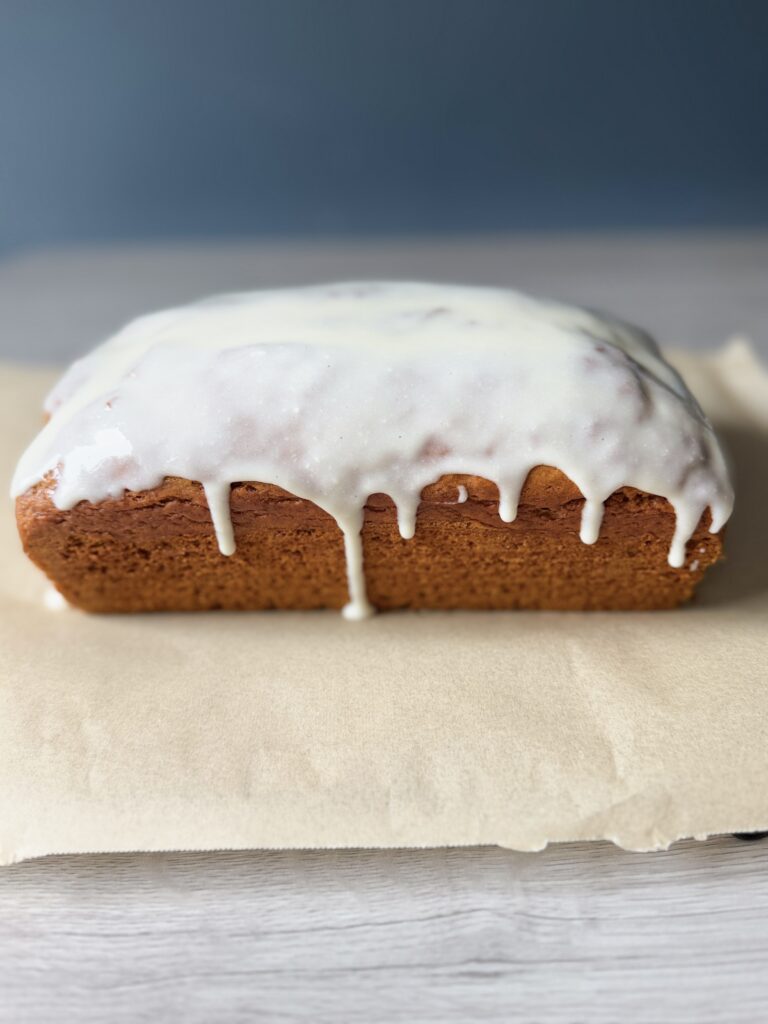 frosting sourdough pumpkin loaf