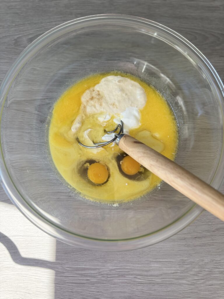 mixing snickerdoodle muffins