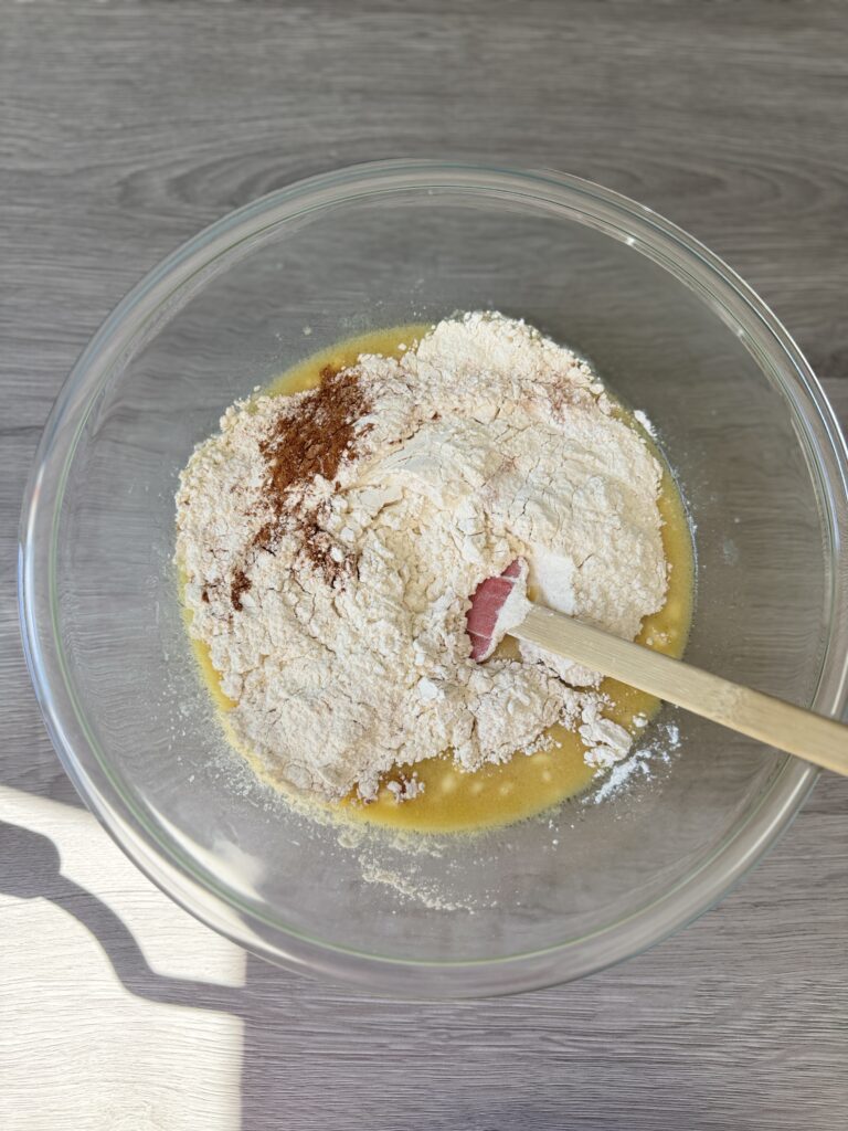 mixing snickerdoodle muffins