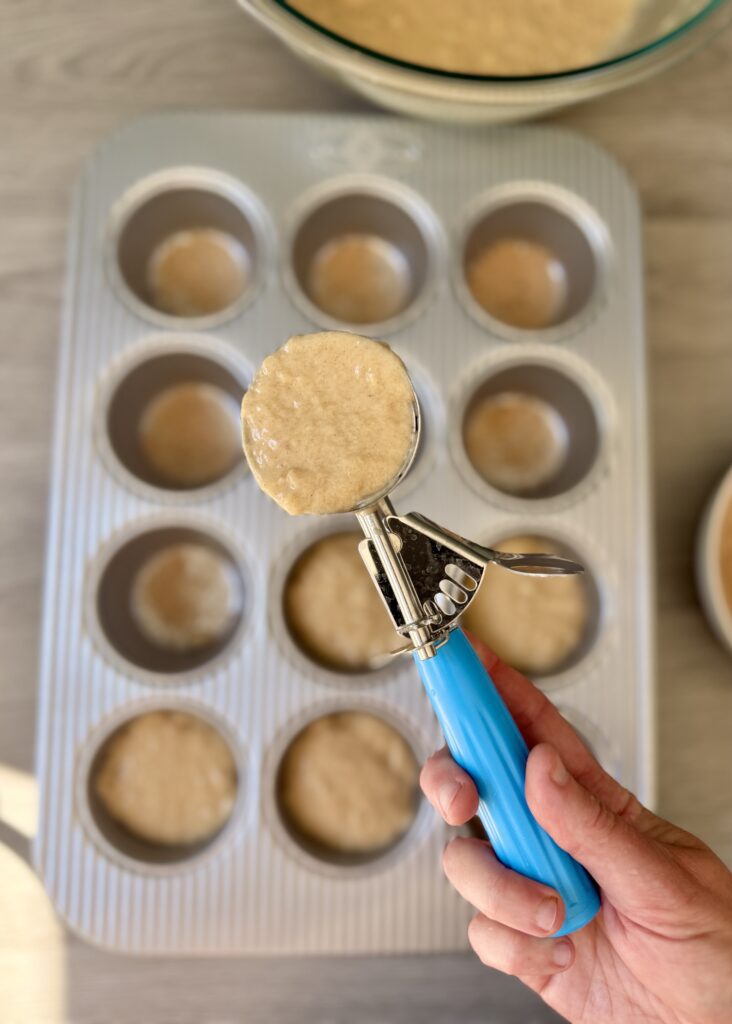 portioning snickerdoodle muffins