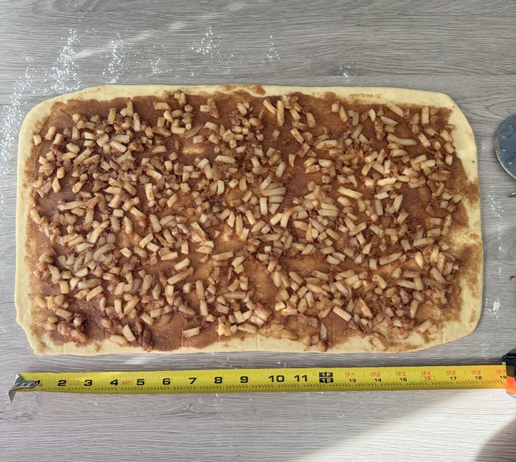 cutting cinnamon rolls