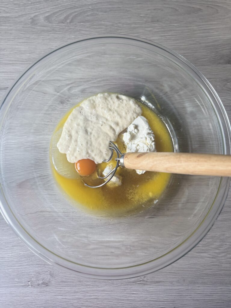 mixing apple cider donut muffins